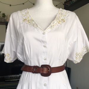 Genuine Italian Leather w/ cross-stitch accent.